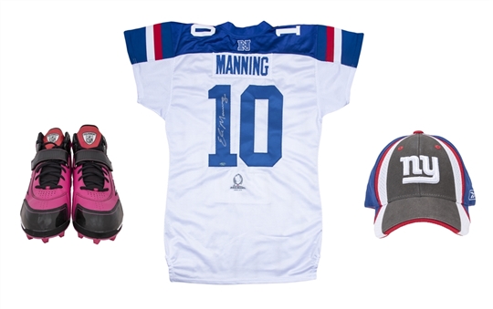 Lot of (3) Eli Manning Game Used and Issued Items Including Signed Pro Bowl Jersey, Sideline Worn Hat, and Cleats (Steiner)